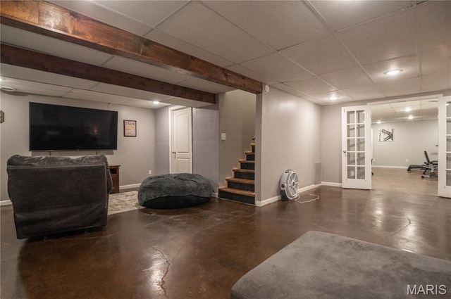 16533 Chateau Ln, Dexter, MO 63841 - finished basement featuring a paneled ceiling, stairway, french doors, and recessed lighting