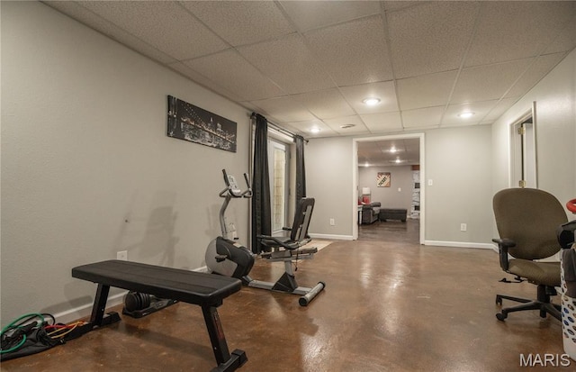 16533 Chateau Ln, Dexter, MO 63841 - exercise room featuring baseboards and a drop ceiling