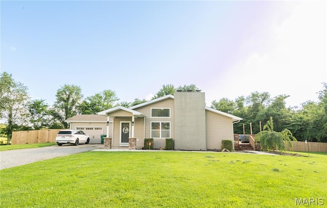 16533 Chateau Ln, Dexter, MO 63841 - mid-century inspired home with gravel driveway, an attached garage, and a chimney