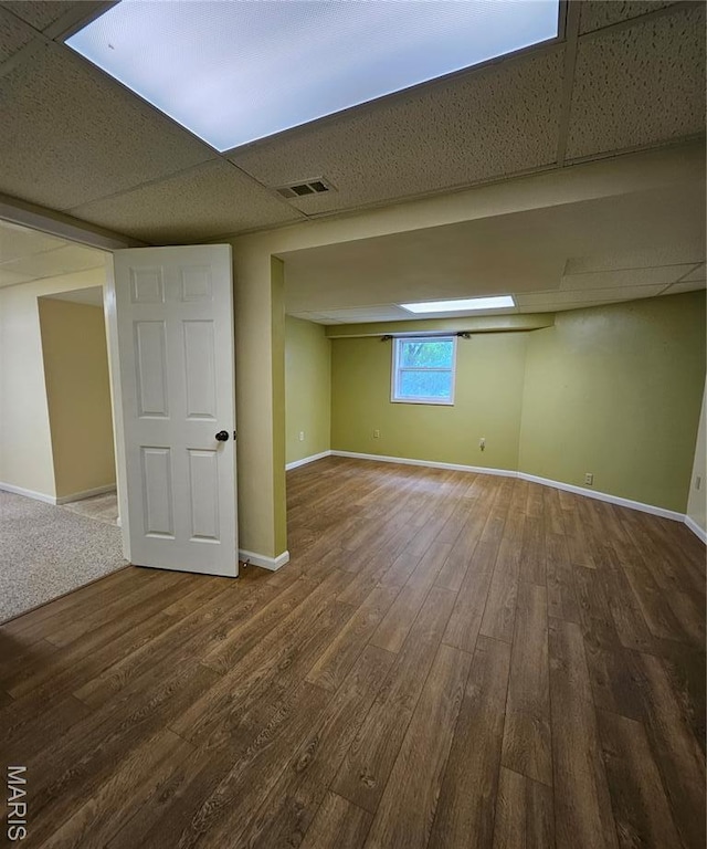 1504 Dean Ave, Hannibal, MO 63401 - below grade area featuring wood finished floors and baseboards