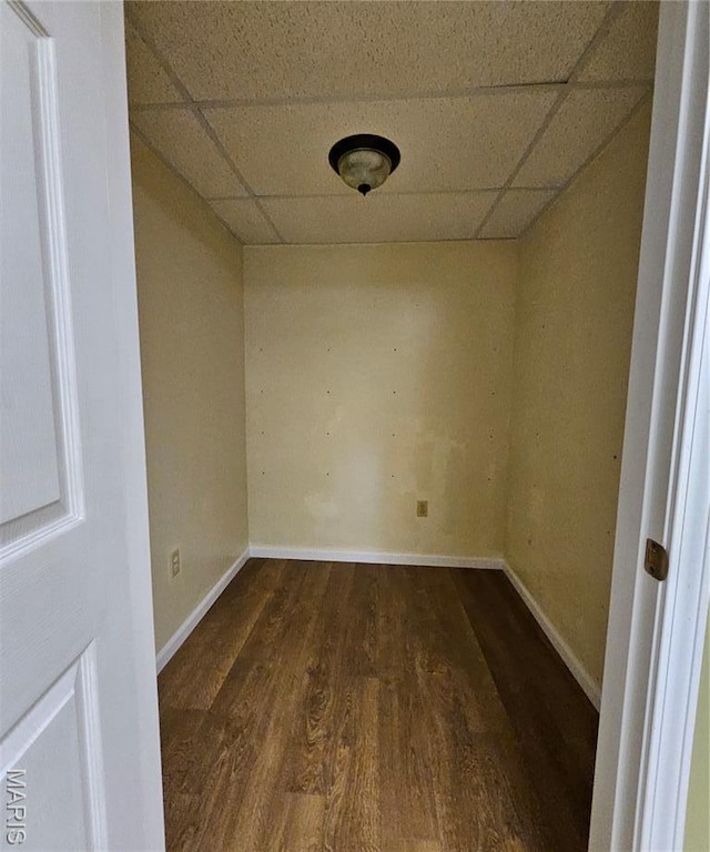 1504 Dean Ave, Hannibal, MO 63401 - unfurnished room with a drop ceiling and dark wood-style flooring