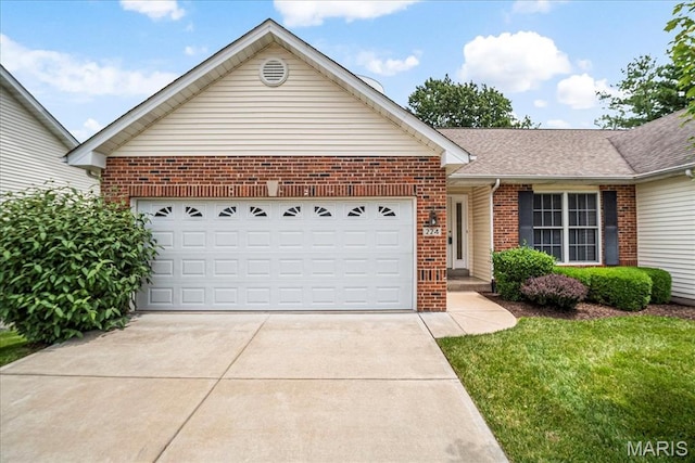 224 Fairgate Dr Unit 60A, Saint Peters, MO 63376 - ranch-style house with brick siding, concrete driveway, an attached garage, a shingled roof, and a front yard