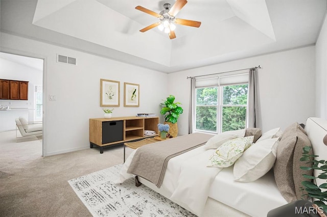 224 Fairgate Dr Unit 60A, Saint Peters, MO 63376 - bedroom with a raised ceiling, light carpet, and ceiling fan