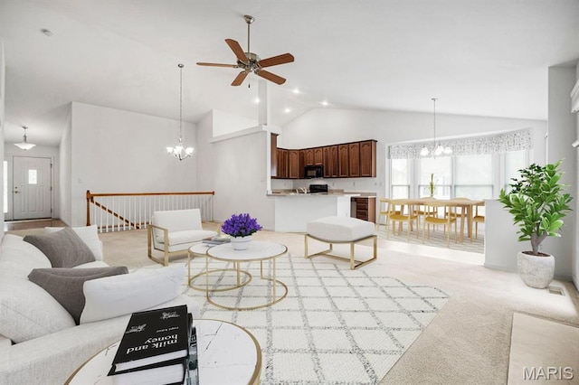 224 Fairgate Dr Unit 60A, Saint Peters, MO 63376 - living room with a chandelier, plenty of natural light, ceiling fan, light carpet, and high vaulted ceiling