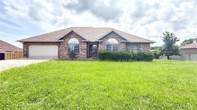 200 April Dr, Saint Robert, MO 65584 - ranch-style house featuring driveway, an attached garage, brick siding, and roof with shingles
