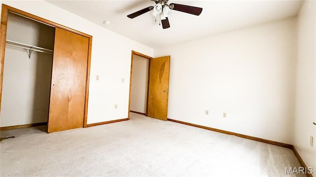 200 April Dr, Saint Robert, MO 65584 - unfurnished bedroom with light carpet, a closet, and a ceiling fan