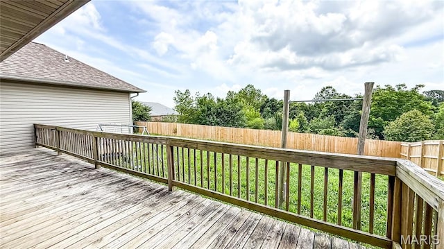 200 April Dr, Saint Robert, MO 65584 - wooden terrace with a fenced backyard