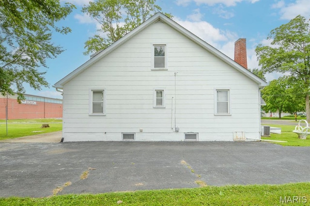 307 S S St, Smithton, IL 62285 - view of side of property with a chimney and a lawn