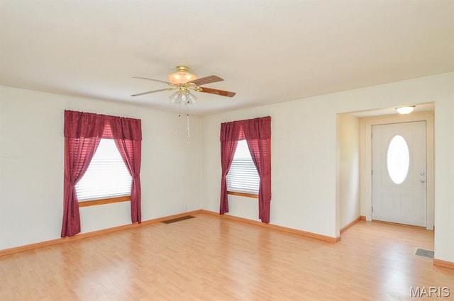 307 S S St, Smithton, IL 62285 - foyer featuring healthy amount of natural light, light wood-style floors, and a ceiling fan