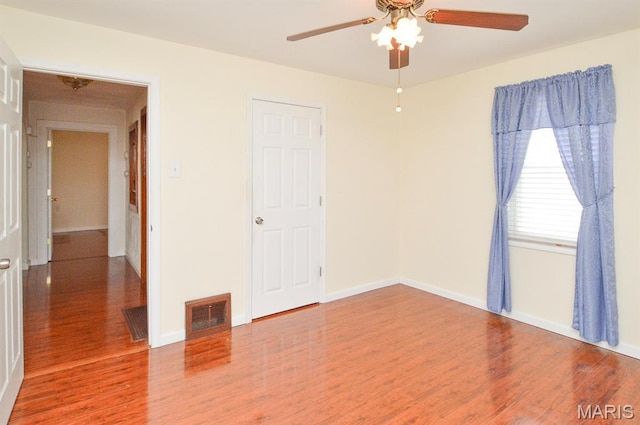 307 S S St, Smithton, IL 62285 - empty room featuring wood finished floors and a ceiling fan