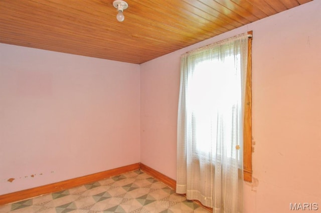 307 S S St, Smithton, IL 62285 - empty room with wooden ceiling and baseboards