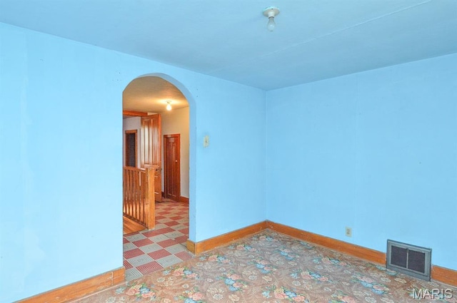 307 S S St, Smithton, IL 62285 - spare room with arched walkways and baseboards