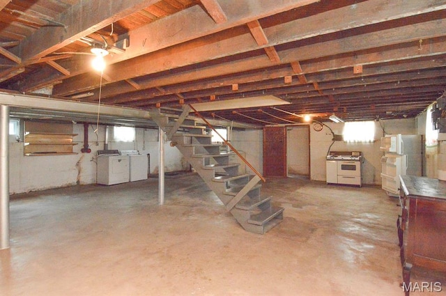 307 S S St, Smithton, IL 62285 - below grade area with washer and dryer, stairway, freestanding refrigerator, and plenty of natural light