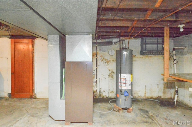 307 S S St, Smithton, IL 62285 - unfinished basement featuring water heater and heating unit