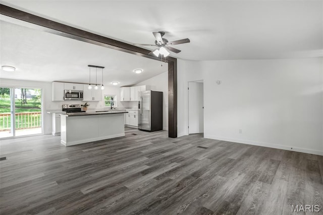 16 Garrett Ln, Defiance, MO 63341 - unfurnished living room featuring ceiling fan and dark wood-type flooring