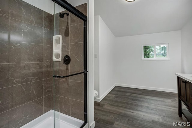 16 Garrett Ln, Defiance, MO 63341 - bathroom with a stall shower, vanity, and wood finished floors