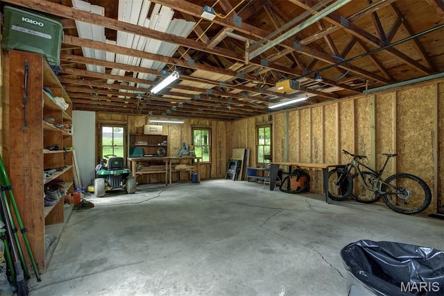 16 Garrett Ln, Defiance, MO 63341 - garage featuring a garage door opener