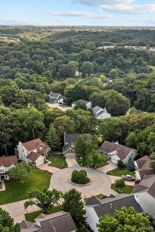 14 Greystoke Ct, Ballwin, MO 63021 - aerial view of residential area featuring a heavily wooded area