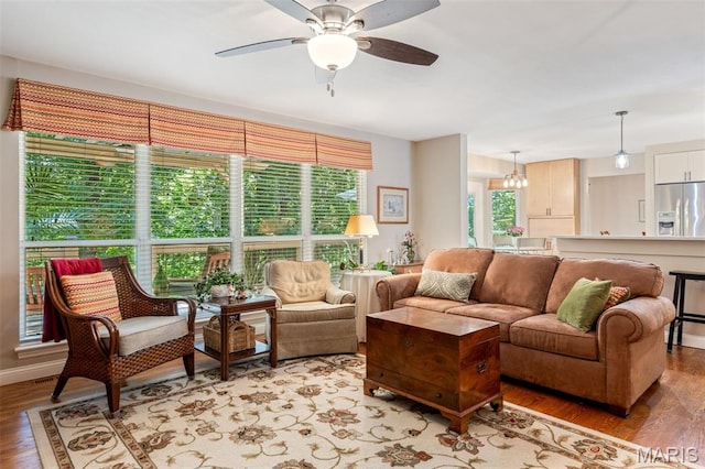 14 Greystoke Ct, Ballwin, MO 63021 - living area with light wood-style floors and a ceiling fan
