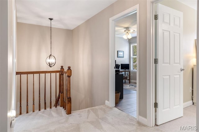 14 Greystoke Ct, Ballwin, MO 63021 - hall featuring an upstairs landing, carpet flooring, an office area, and a chandelier