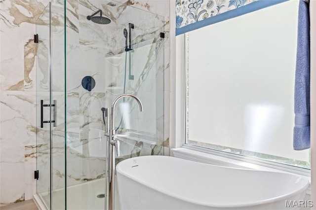 14 Greystoke Ct, Ballwin, MO 63021 - bathroom featuring a soaking tub and a marble finish shower