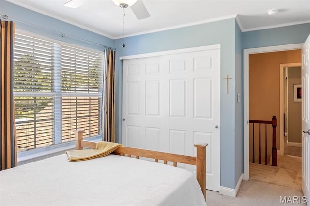 14 Greystoke Ct, Ballwin, MO 63021 - bedroom with light colored carpet, a closet, ornamental molding, and ceiling fan