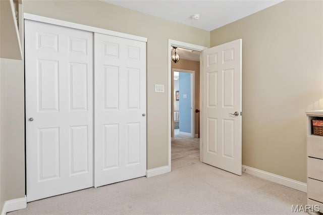 14 Greystoke Ct, Ballwin, MO 63021 - unfurnished bedroom featuring light carpet and a closet