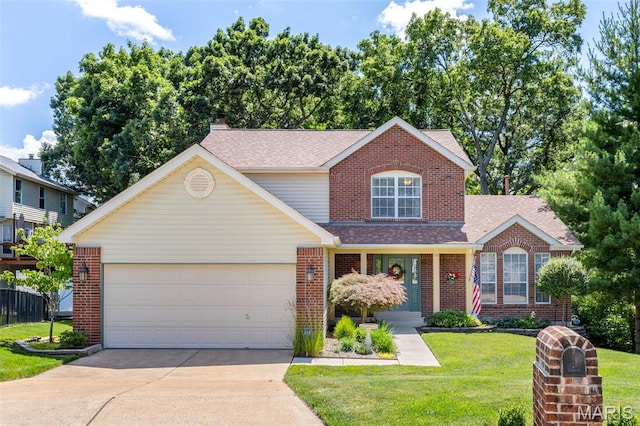 14 Greystoke Ct, Ballwin, MO 63021 - traditional-style house featuring brick siding, driveway, a shingled roof, an attached garage, and a front yard