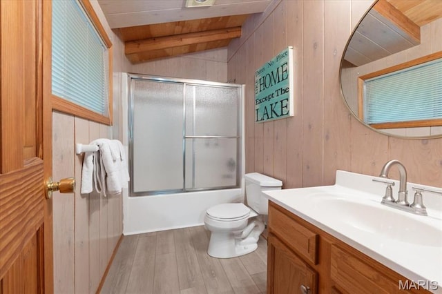 2506 Alpine Woods Dr, Wright City, MO 63390 - bathroom featuring vanity, wood finished floors, wood walls, shower / bath combination with glass door, and a wooden ceiling with exposed beams