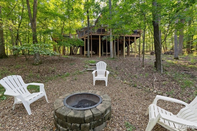 2506 Alpine Woods Dr, Wright City, MO 63390 - view of yard with a fire pit, stairs, and a deck