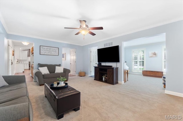 1008 Westrun Dr, Ballwin, MO 63021 - living area with ceiling fan, ornamental molding, and light carpet
