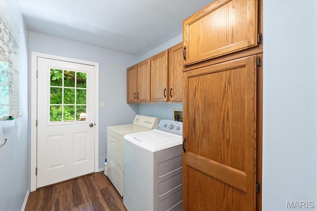 1008 Westrun Dr, Ballwin, MO 63021 - laundry room with cabinet space, washer and clothes dryer, and dark wood-style floors