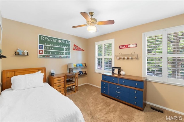 1008 Westrun Dr, Ballwin, MO 63021 - bedroom featuring light carpet and a ceiling fan