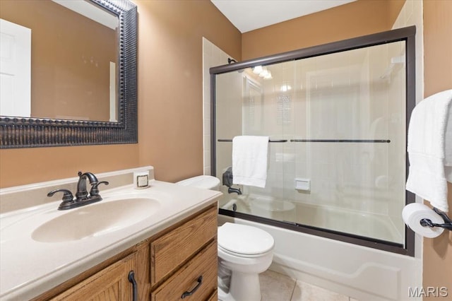1008 Westrun Dr, Ballwin, MO 63021 - full bath featuring vanity, combined bath / shower with glass door, and tile patterned floors