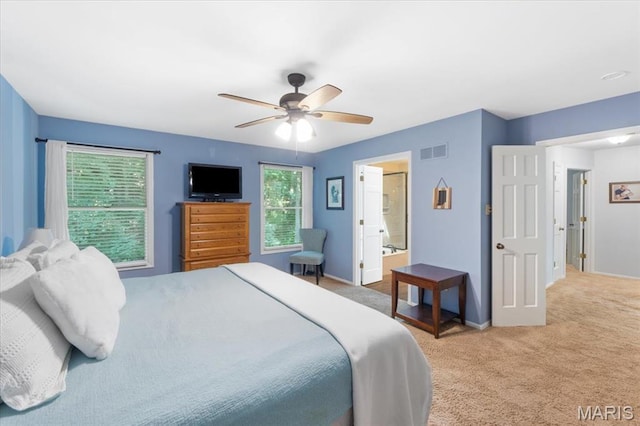 1008 Westrun Dr, Ballwin, MO 63021 - carpeted bedroom featuring ceiling fan and connected bathroom