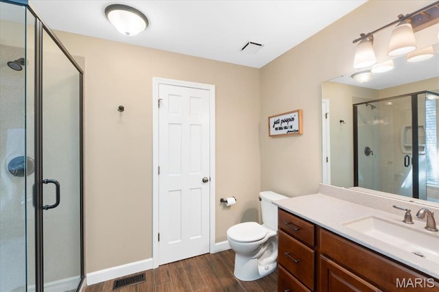 1008 Westrun Dr, Ballwin, MO 63021 - full bathroom featuring wood finished floors, vanity, and a shower stall