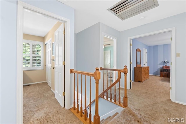 1008 Westrun Dr, Ballwin, MO 63021 - hall with an upstairs landing and carpet flooring