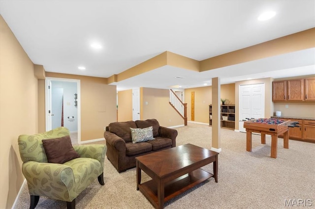 1008 Westrun Dr, Ballwin, MO 63021 - living room featuring light colored carpet, stairway, and recessed lighting