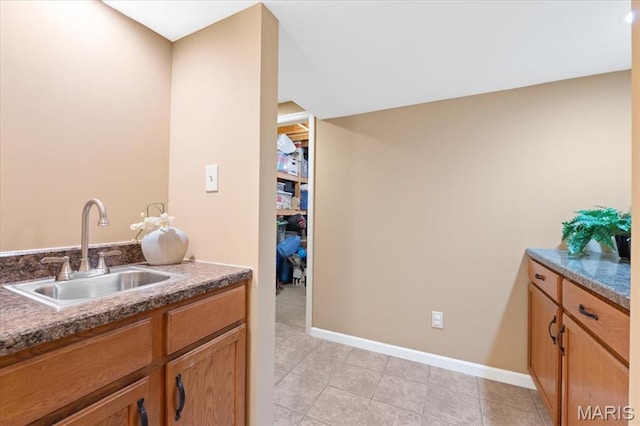 1008 Westrun Dr, Ballwin, MO 63021 - bar area featuring a sink and light tile patterned flooring