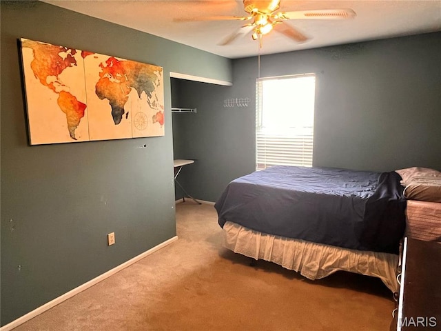 3241 Principia Ave, Saint Charles, MO 63301 - carpeted bedroom featuring a ceiling fan and baseboards