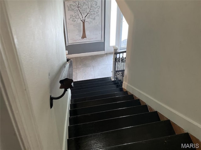 3241 Principia Ave, Saint Charles, MO 63301 - stairway with baseboards and tile patterned flooring