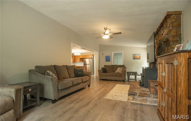 116 Buttry Ln, Wappapello, MO 63966 - living area featuring a ceiling fan, light wood-style floors, and vaulted ceiling