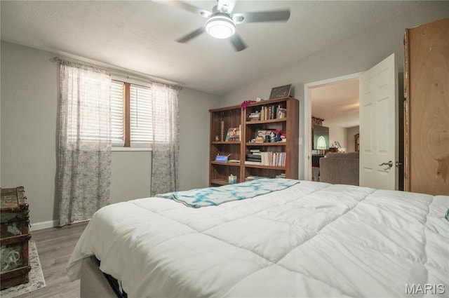 116 Buttry Ln, Wappapello, MO 63966 - bedroom featuring wood finished floors and a ceiling fan
