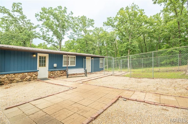 116 Buttry Ln, Wappapello, MO 63966 - view of front of property featuring stone siding, board and batten siding, and a metal roof
