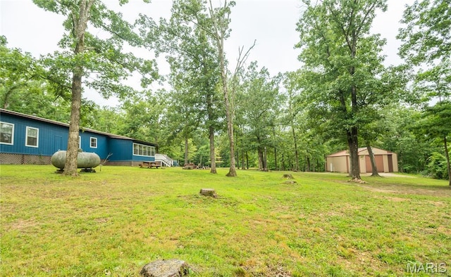 116 Buttry Ln, Wappapello, MO 63966 - view of green lawn featuring an outbuilding