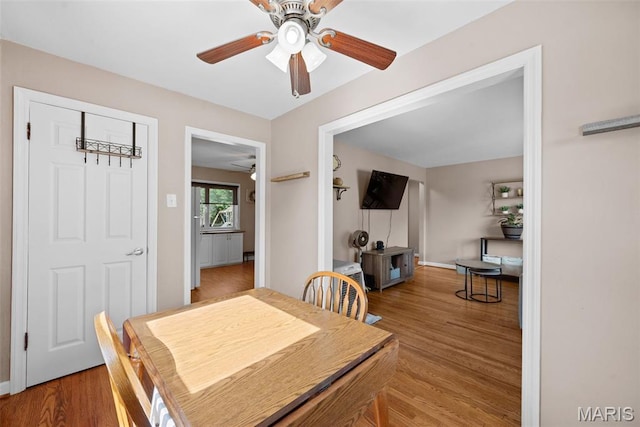 10256 Saint Dennis Ln, Saint Ann, MO 63074 - dining room with ceiling fan and wood finished floors