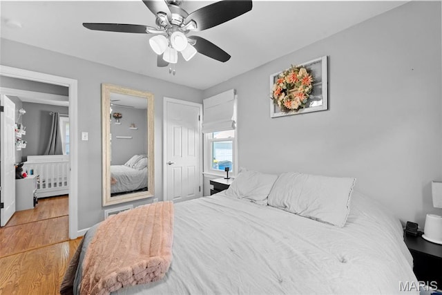 10256 Saint Dennis Ln, Saint Ann, MO 63074 - bedroom featuring wood finished floors and ceiling fan