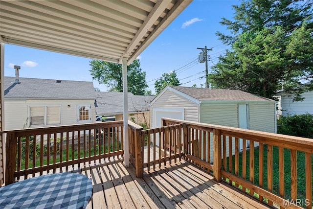 10256 Saint Dennis Ln, Saint Ann, MO 63074 - wooden deck with an outbuilding and a garage
