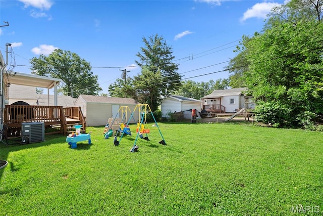 10256 Saint Dennis Ln, Saint Ann, MO 63074 - view of yard with a playground, a storage unit, and a wooden deck