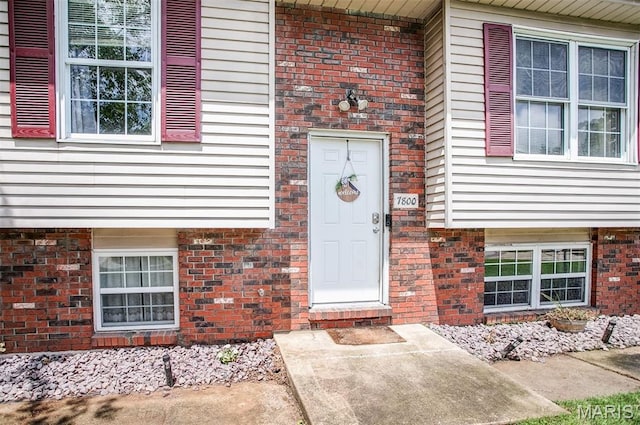 7800 Chuck Ct, Godfrey, IL 62035 - doorway to property with brick siding